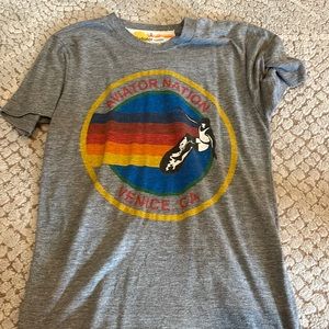 Moderately worn AV tee